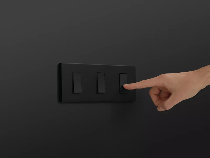 Hand interacting with a Simon 270 wiring device