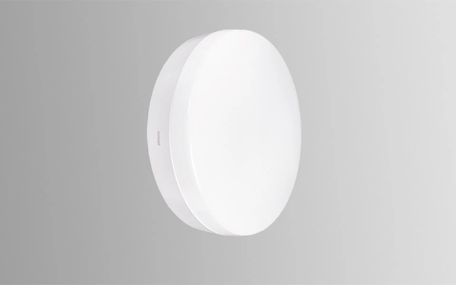 Luminária de parede Simon 717 com design neutro e atemporal em áreas comunitárias