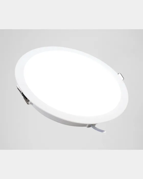 Round white Simon 719 downlight, 3/4 view on light background