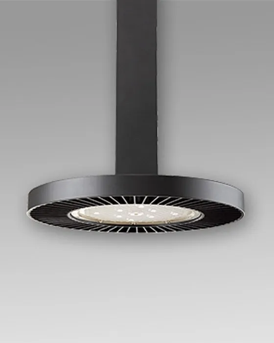 Simon 816 circular black industrial luminaire suspended viewed from below showing the LED optic