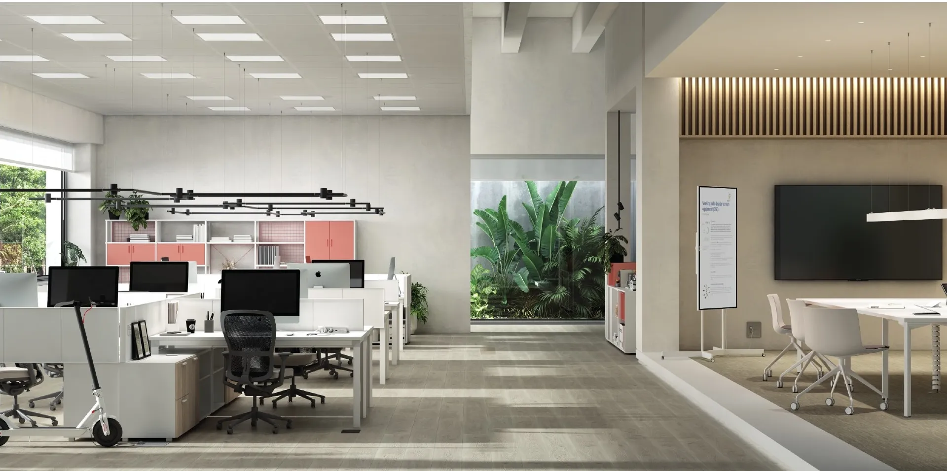 Simon Flash in an open-office workspace with biofilia and natural light