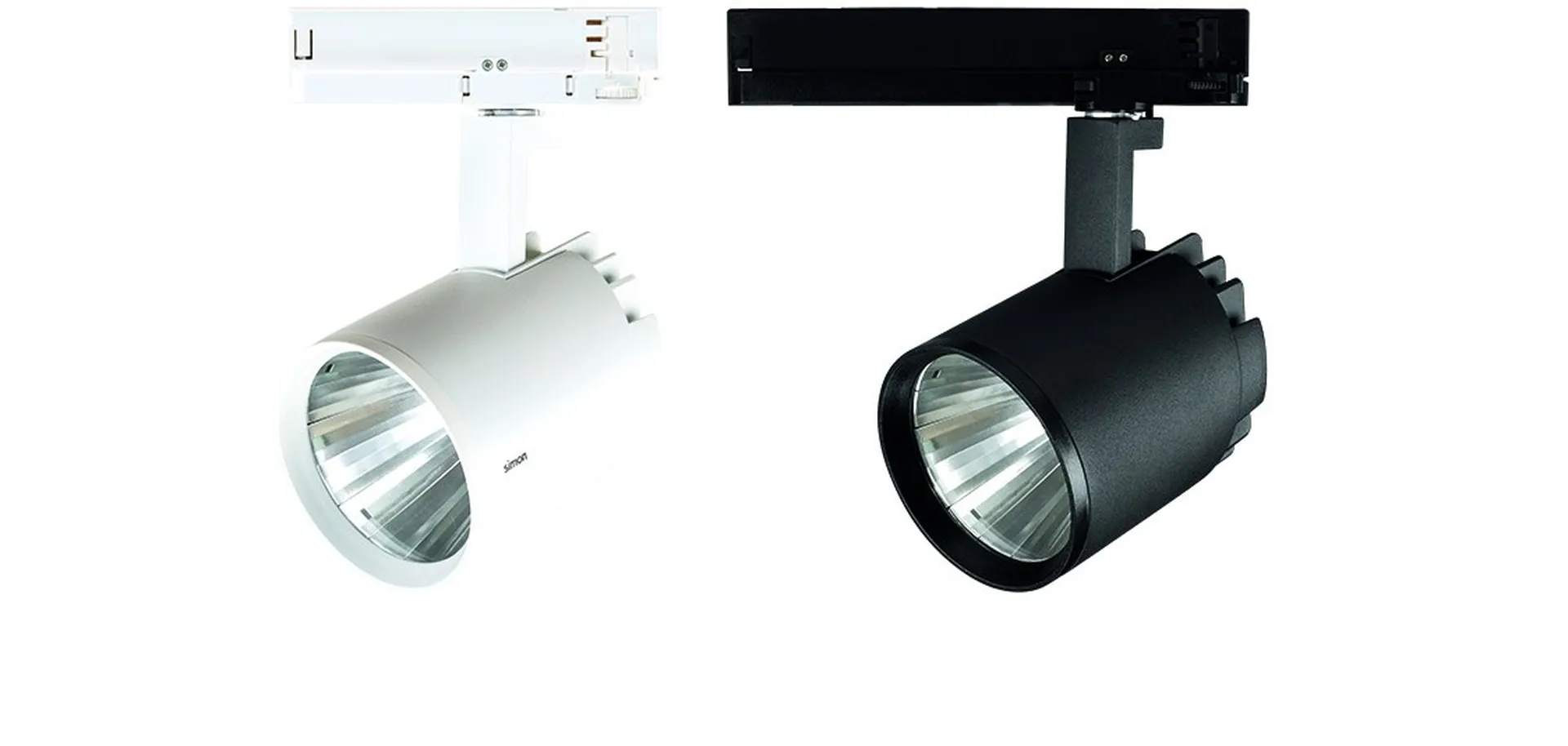 Dos spotlights Simon 650 blanco y negro sobre carril trifásico, vista frontal óptica