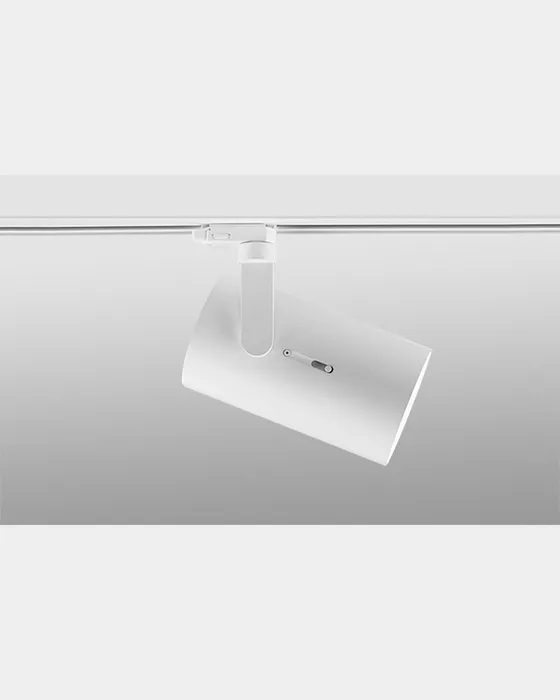 Proyector Simon Point sobre fondo gris claro mostrando las opciones de luz personalizada