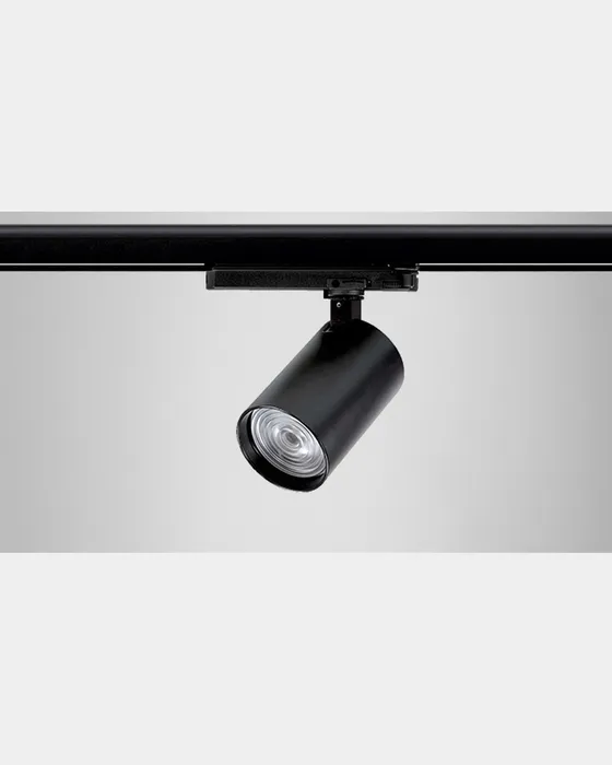 Spot cylindrique Simon 615 noir vue 3/4 avec nid d'abeilles anti-éblouissement visible