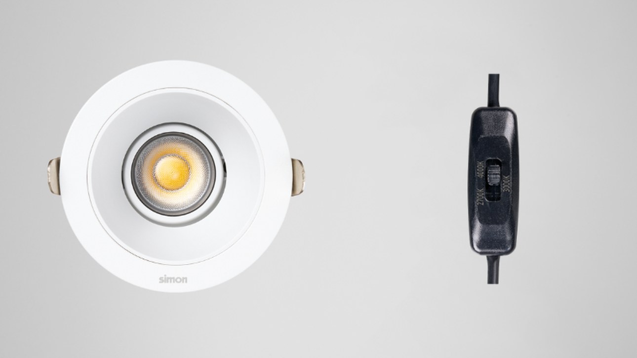 Simon 709 white downlight switched on with warm light and dip-switch device for temperature selector