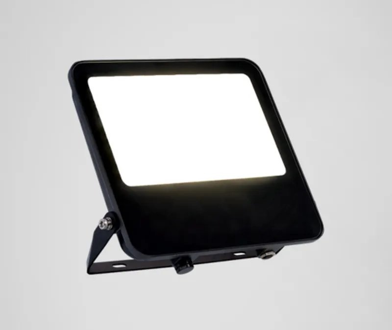 Simon 889 black LED projector with mounting bracket viewed at an angle showing the illuminated LED optic