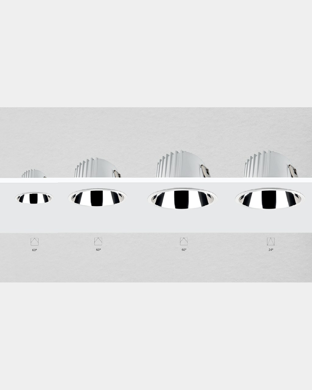 Simon 800 collection: four downlights mounted on ceiling, three sizes with 60° optic and the largest also available with 24° closed optic