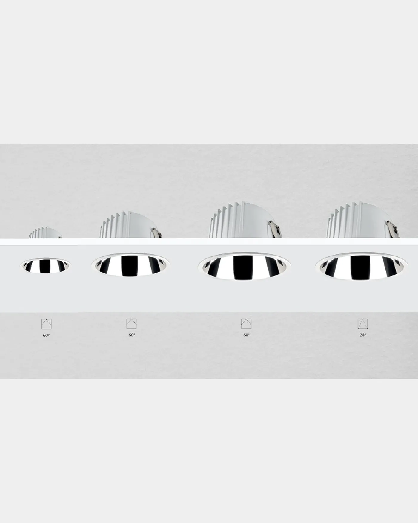 Simon 800 collection: four downlights mounted on ceiling, three sizes with 60° optic and the largest also available with 24° closed optic