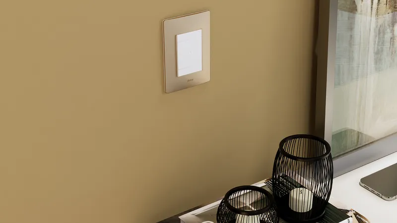 Simon 26 iO Smart Home lifestyle — living room with iO devices.