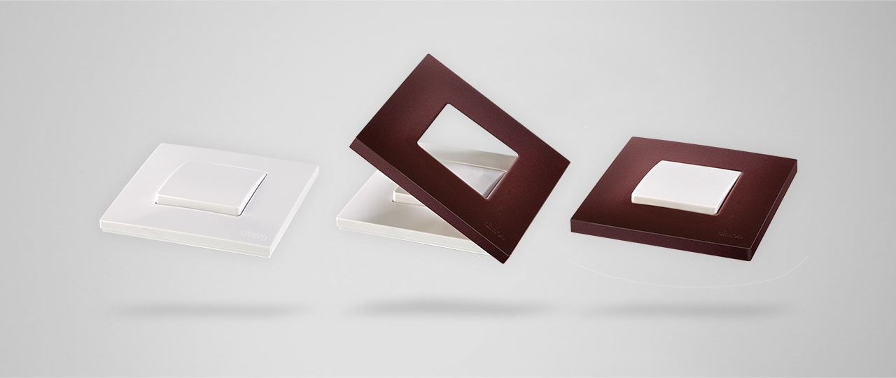 Simon 27 Play — three mechanisms with varied frames (white, burgundy, black) floating on grey background