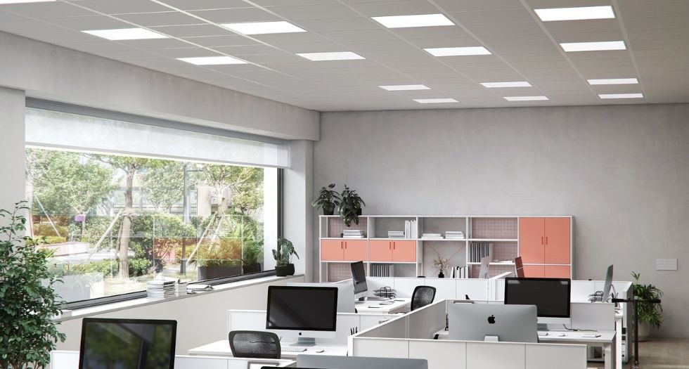 Office with modular technical ceiling lit with Simon 729 luminaires