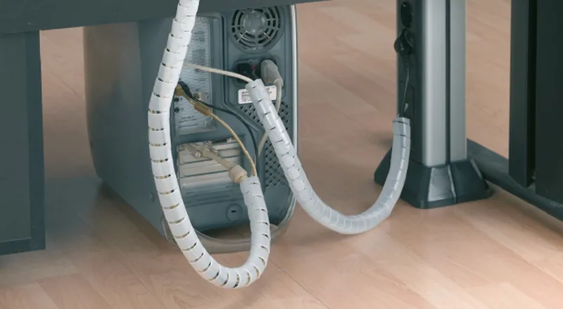Helical cable organiser under desk