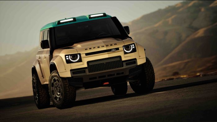 Tan and green SUV on a mountain road, showcasing rugged terrain capabilities with distinctive headlights and large off-road tires.