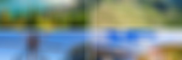 Fotocollage mit 4 Bildern aus Österreich: ein See im Salzkammergut, die Großglocknerhochalpenstraße, ein Weinglas vor Weinreben in der Südsteiermark und ein Foto der Wachau mit der Donau.