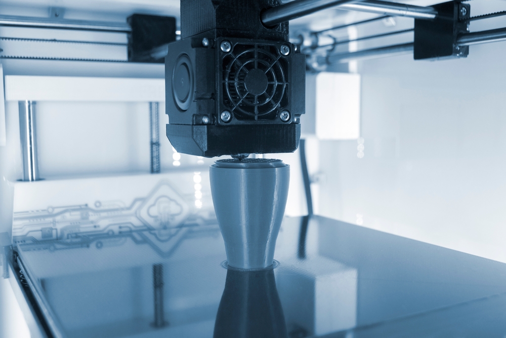 3D printer printing a model.