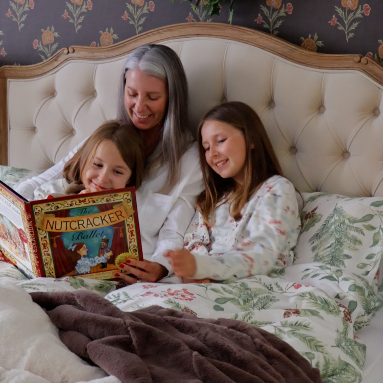 Kelly & Kids in bed reading