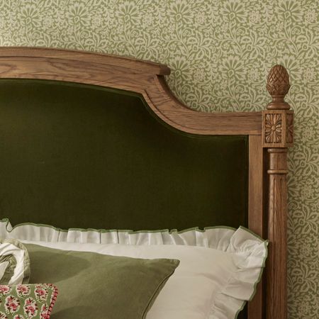 love story olive velvet upholstered bed - finials detail shot.