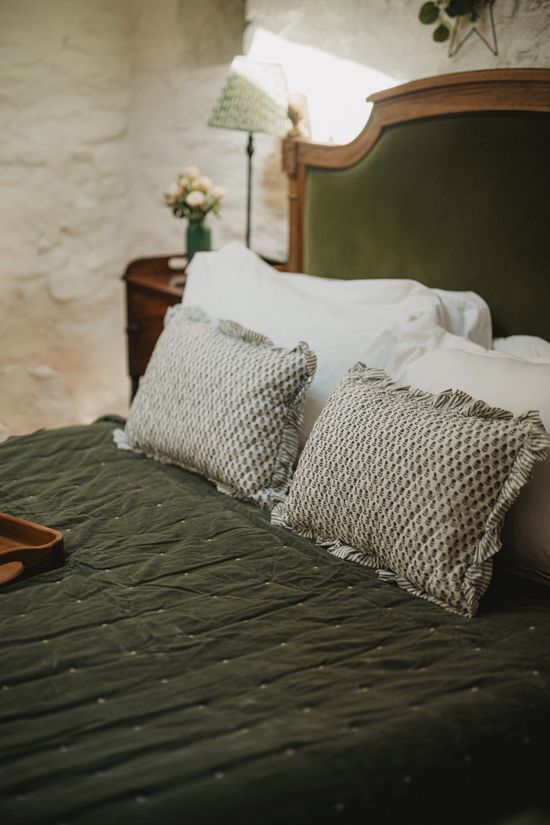 Love Story Olive Bed With Green Velvet throw and Green Cushions
