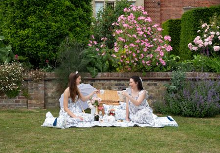 A perfect picnic in Glyndebourne's grounds wearing Toile patterned dresses