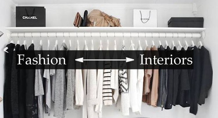 A neatly organized closet with various clothing items on hangers and boxes on the shelf, labeled "Fashion" and "Interiors."