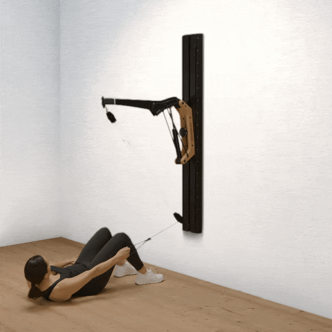 Lateral crunches on the Cable Pulley