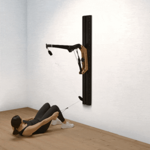 Lateral crunches on the Cable Pulley