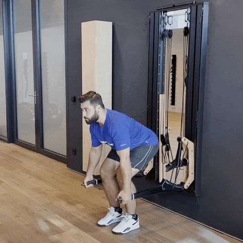 Rowing bent forward with grip on the horn