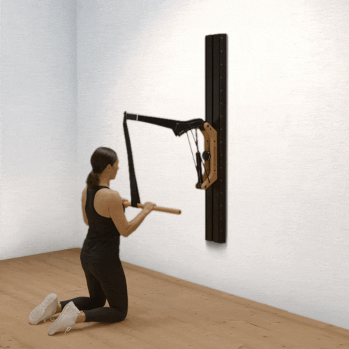 Triceps exercise with handle bar kneeling