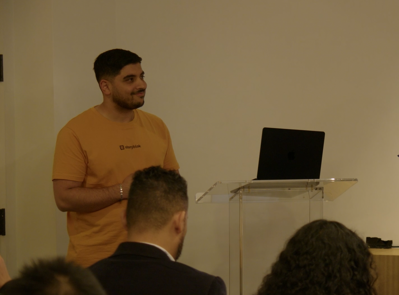 Storyblok employee Arthur Mstoyan presenting AI Search is Here to attendees in Franklin Room East in New York.