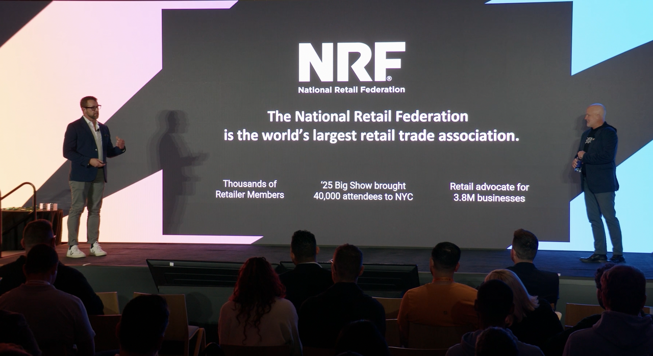 Presenter Chad from RDA and Jason from NRF presenting The AI Powered Composable Roadmap sponsor session to attendees on the main keynote stage at JoyConf New York NY.