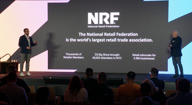 Presenter Chad from RDA and Jason from NRF presenting The AI Powered Composable Roadmap sponsor session to attendees on the main keynote stage at JoyConf New York NY.