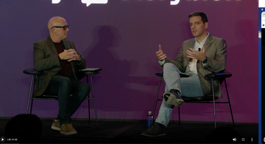 Host and MC Mark Jeffries speaks with AWS during a fireside chat on the keynote main stage session at JoyConf NY.