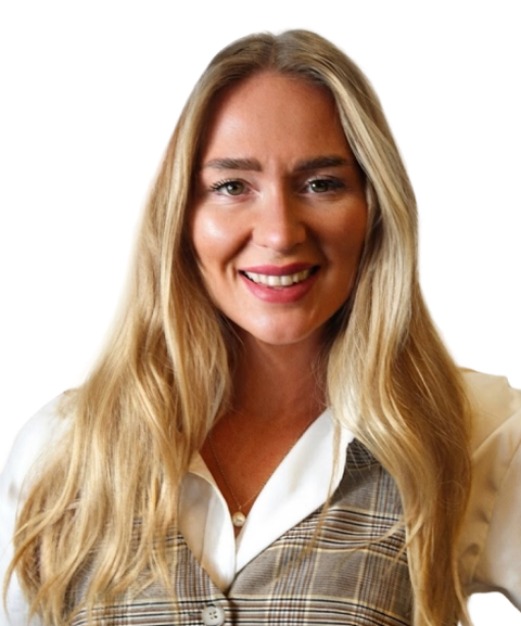 Woman with long blonde hair smiling, wearing a plaid vest over a white blouse, isolated on a white background.