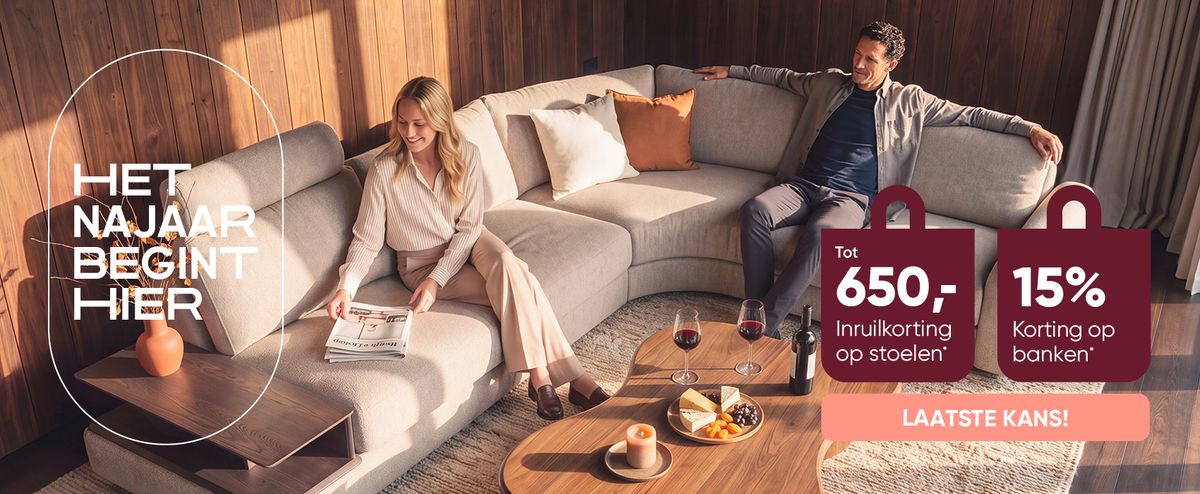 A couple relaxes on a beige sectional sofa in a warmly lit living room, with wine, snacks, and wooden decor. Interior design promotion text overlay.
