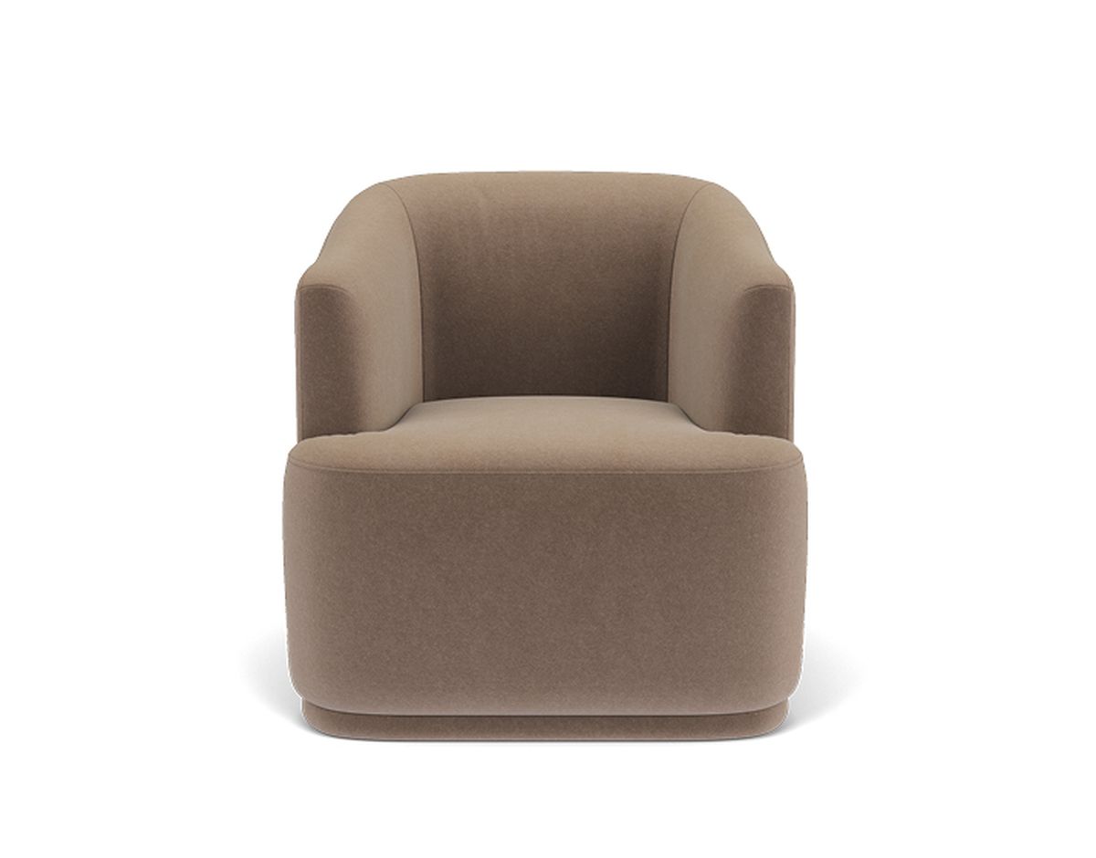 A beige, modern armchair with a rounded back and armrests, upholstered in soft fabric, viewed from the front.