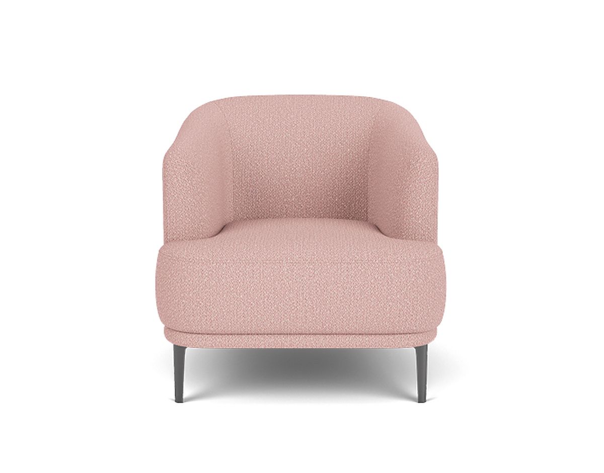 Pink upholstered armchair with curved backrest and slender metal legs, set against a white background.