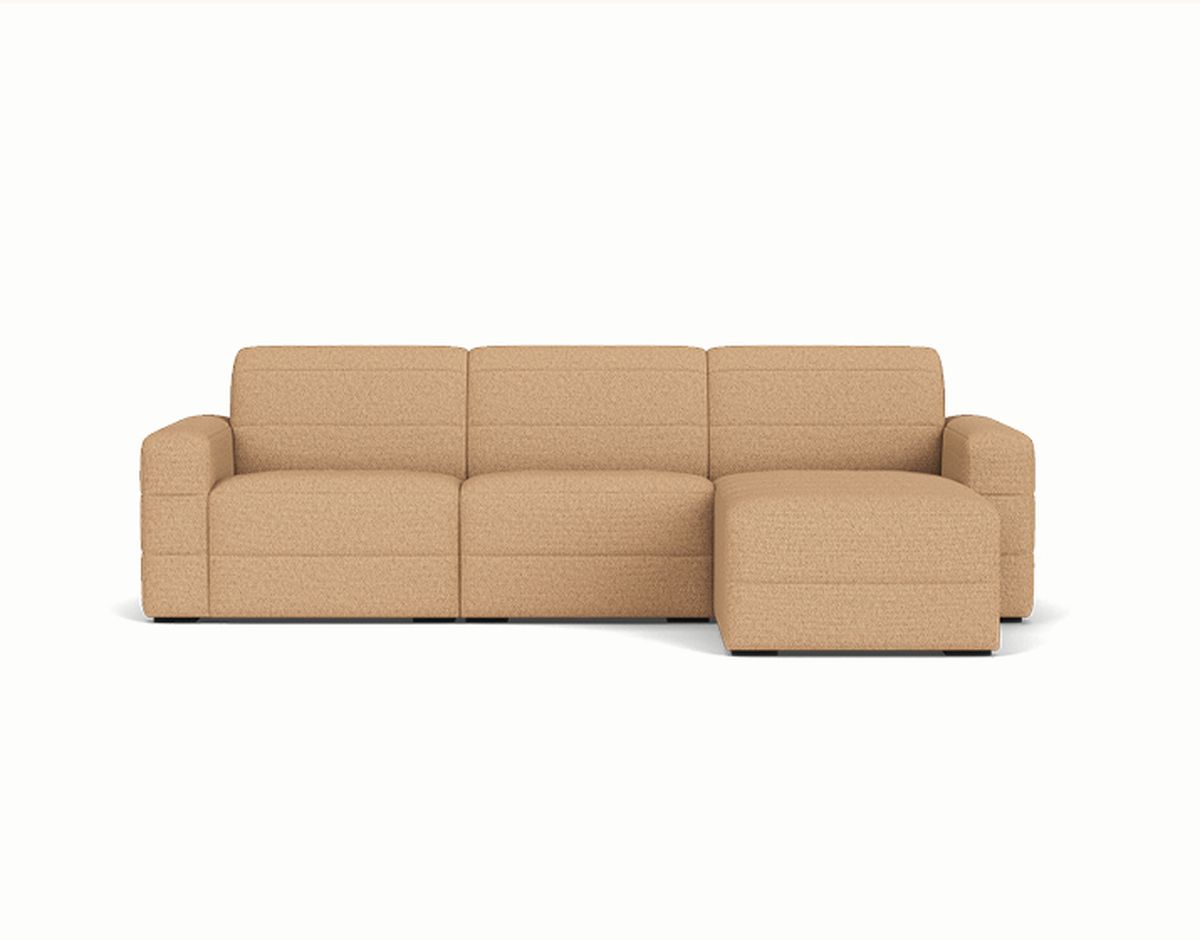 A light brown, L-shaped sectional sofa with three seats and a chaise on the right side against a plain white background.