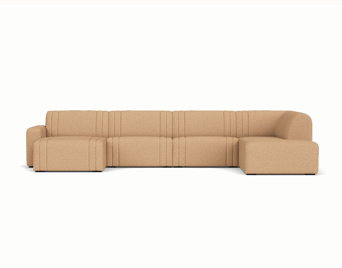 A large, beige, L-shaped sectional sofa with clean lines and plush cushions, set against a white background.