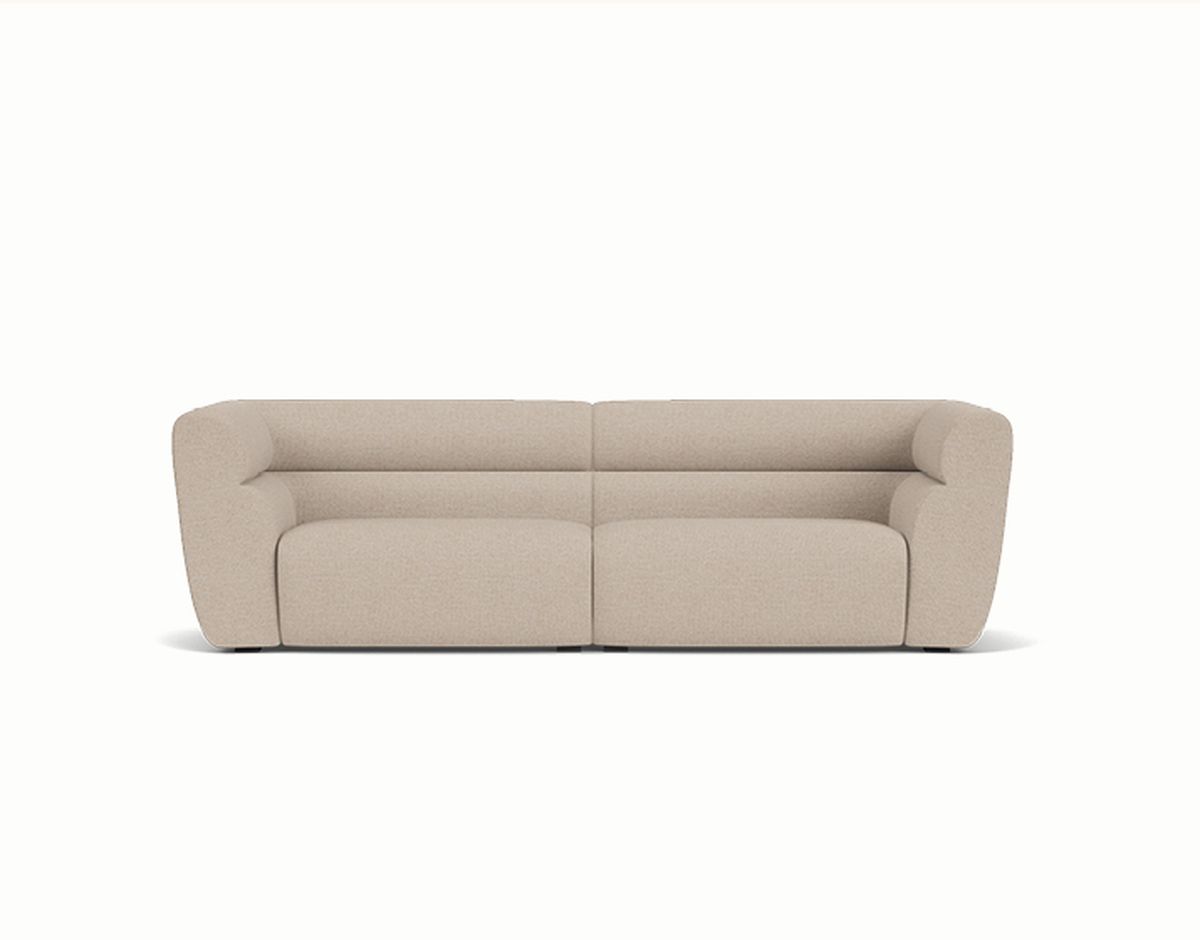 A beige modern sectional sofa with clean lines and cushioned arms, set against a plain white background.