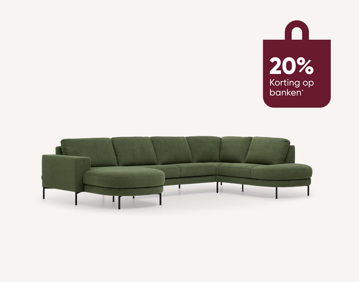 Green L-shaped sectional sofa on a white background with a 20% discount label in Dutch.