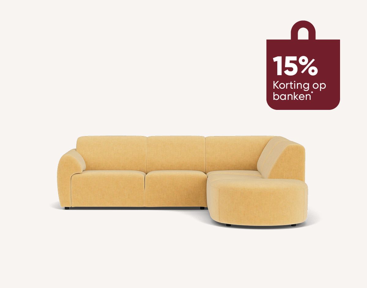 Yellow L-shaped sofa with a rounded corner. A red tag on the top right offers a 15% discount in Dutch.