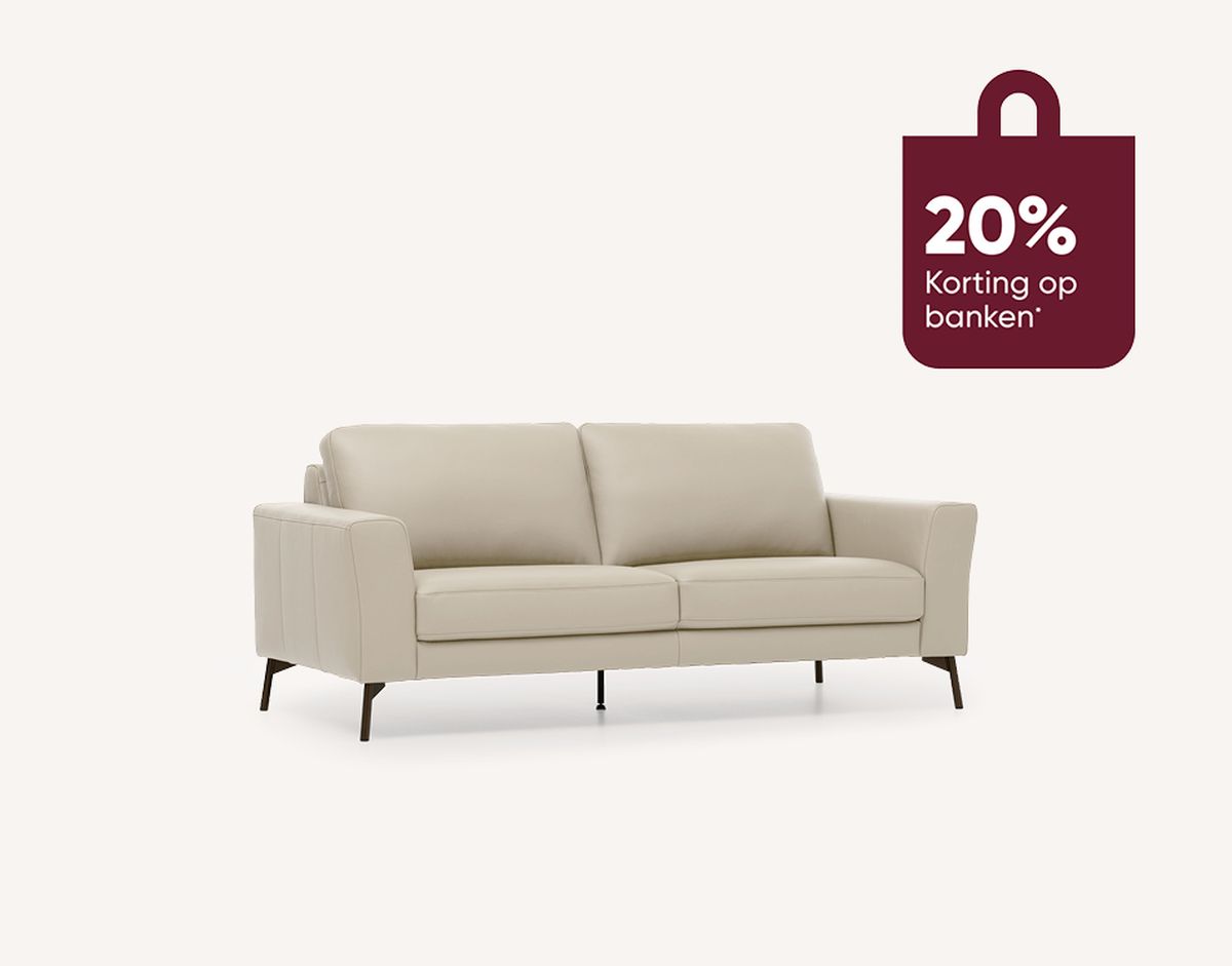 Beige sofa with dark legs on a light background. A maroon bag icon shows "20% Korting op banken" indicating a discount.