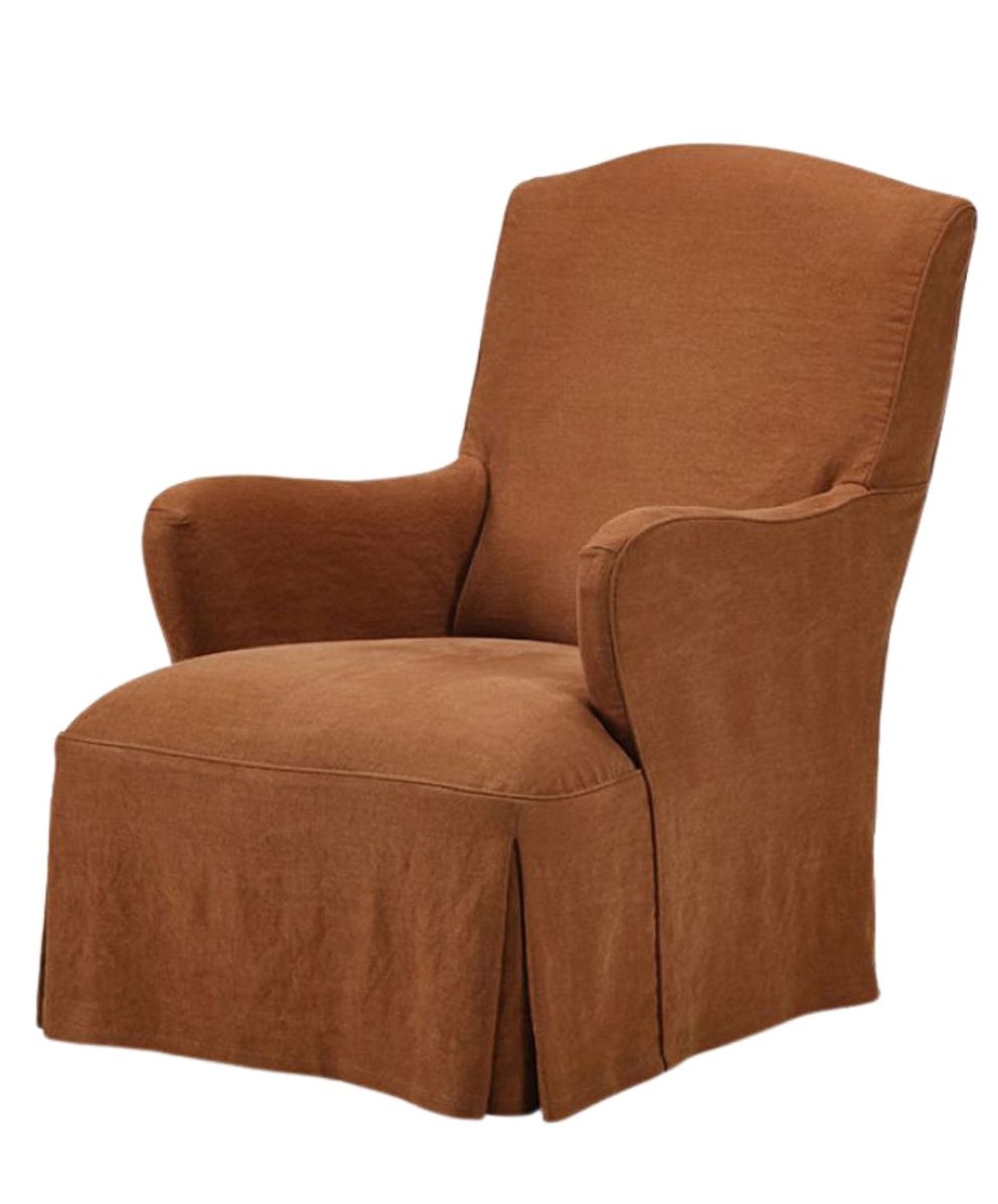 A warm brown, classic one-seater armchair with curved armrests and a loose, pleated skirt. The upholstery has a soft, linen texture, offering a cozy and timeless look.