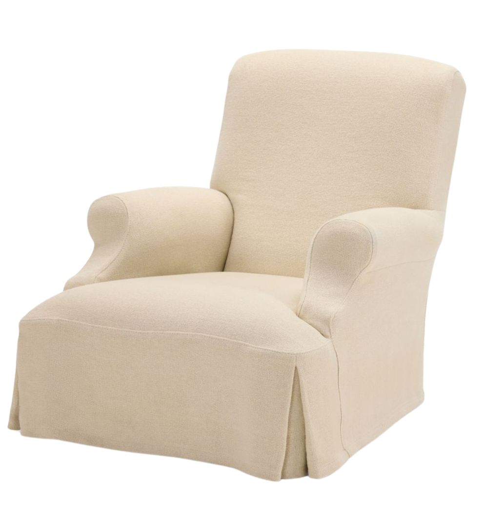A soft, beige upholstered Aster one-seater armchair with rounded arms and a flowing skirt at the base. The chair has a clean, minimalistic look with smooth lines, creating a comfortable and inviting appearance.