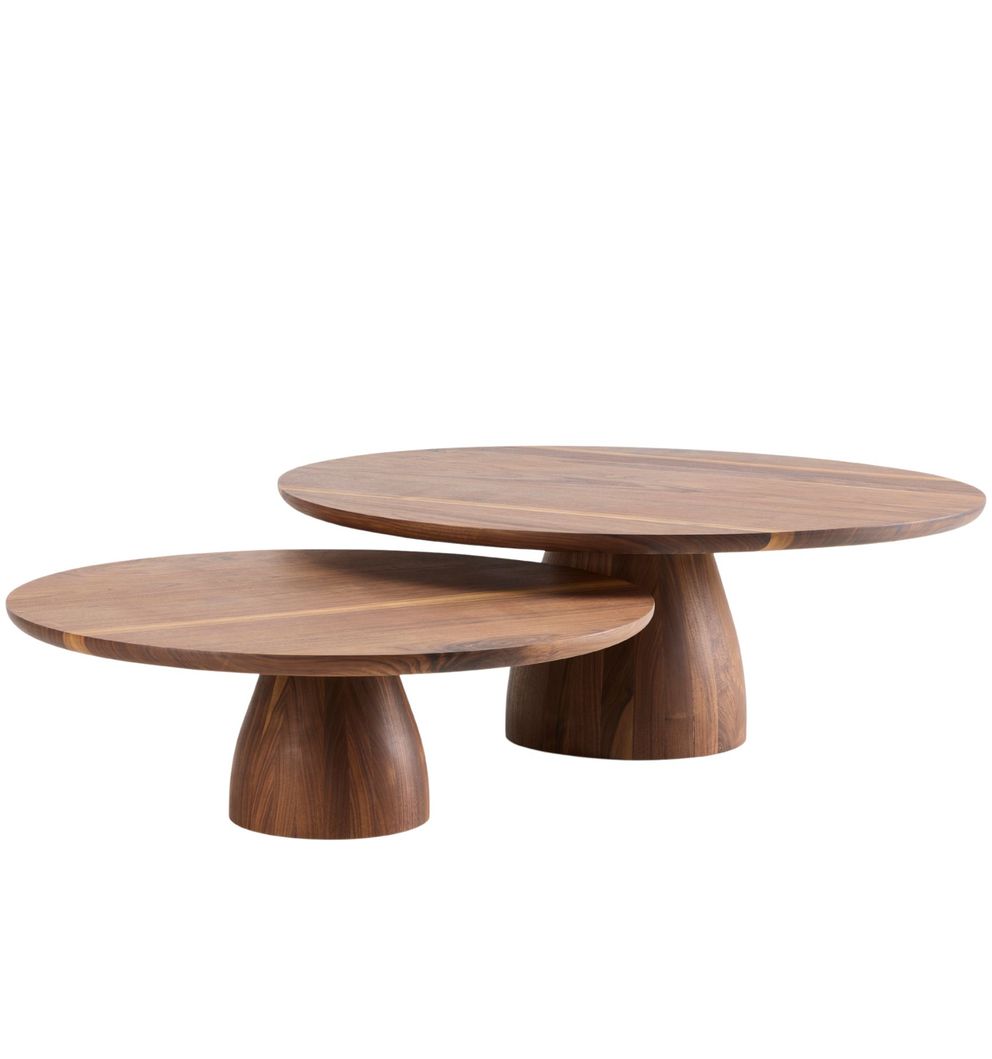 Pair of Nova coffee tables by Collett & Victor, in solid walnut with smooth round tops and sculpted conical pedestal bases, shown in two different heights for nesting.