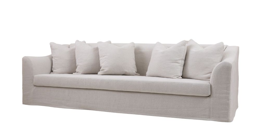 Toscana loose seat sofa with a soft linen fabric, featuring a clean, modern design and five plush cushions.