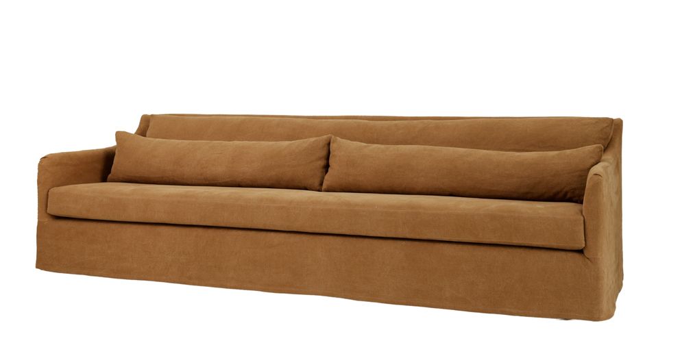 Front-facing view of the Jane sofa, a minimalist three-seater in a warm brown fabric. It features a low-profile design with clean lines, slim armrests, and two long cylindrical back cushions.