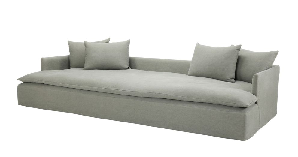 Bilbao sofa in soft grey fabric with a low, deep seat and minimalist block arms, featuring five matching cushions for a relaxed and contemporary look.
