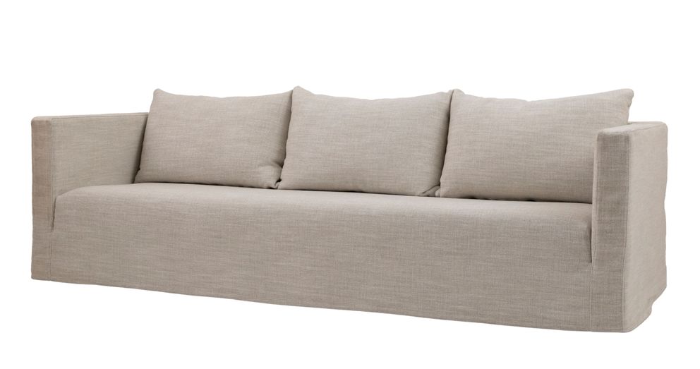 A modern beige sofa from Collett & Victor with three back cushions and clean lines.