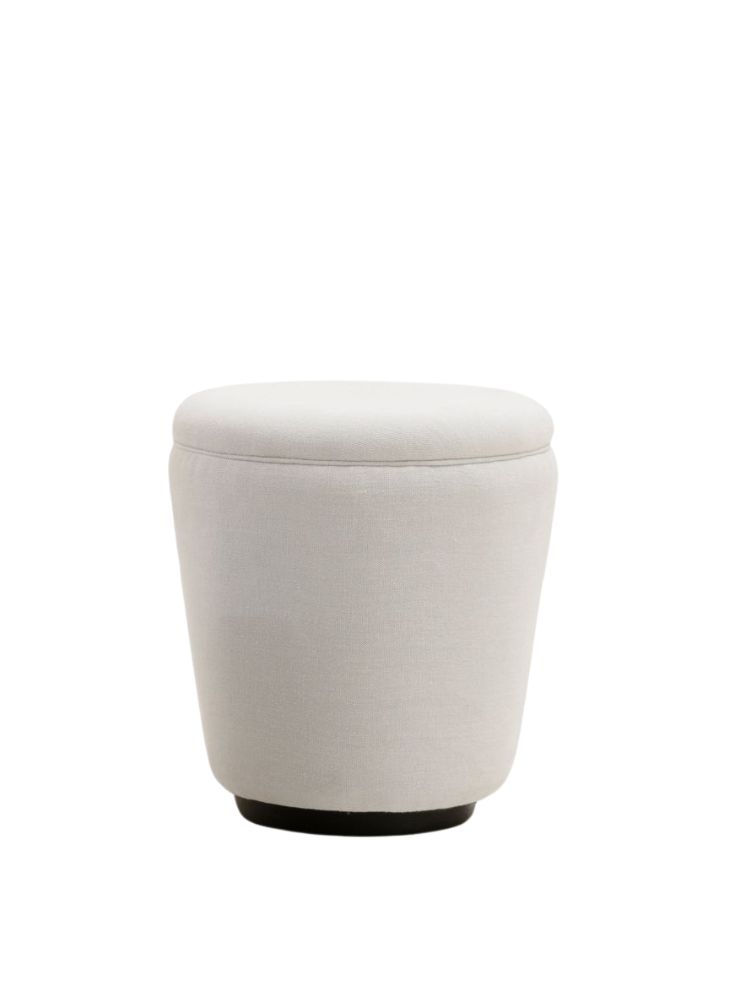Crush pouf in light beige fabric with rounded tapered design and black base by Collett & Victor